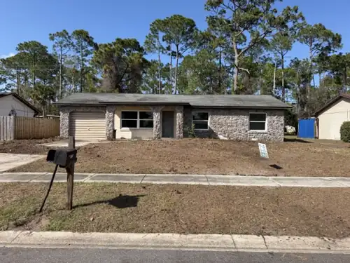 Large pine removal over a Deltona, FL home
